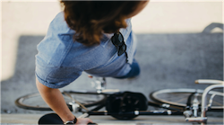 young man with bicycle