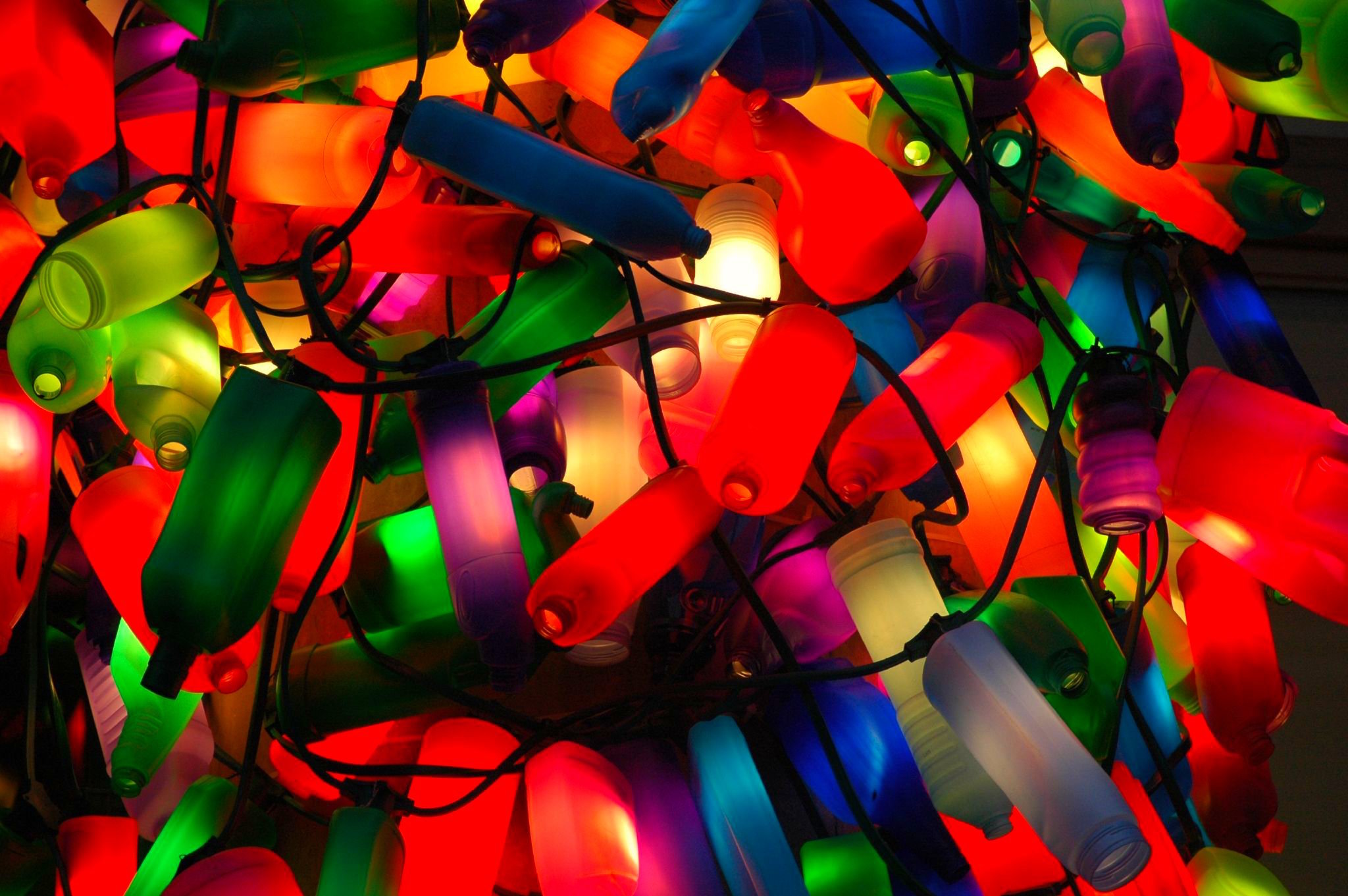 image of multi-coloured light bulbs tangled together