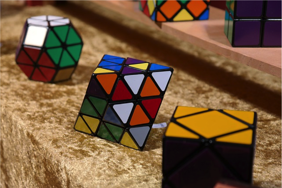 three rubix cubes in a row
